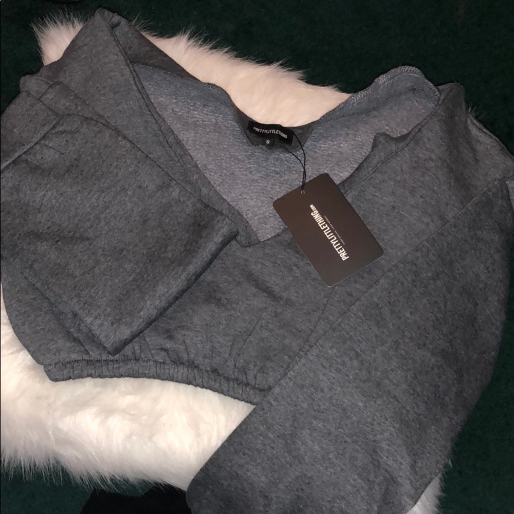 Cropped off shoulder sweater